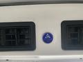 Climate control panel with adjustable air vent openings and a blue circular logo labeled ACC Climate Control