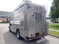 A 2007 Morgan Olson Workhorse W42, a metallic vehicle with a spacious cargo area, equipped with rear steps and multiple access points for loading and unloading goods