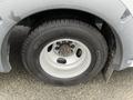 Close-up of a wheel from a 2018 Chevrolet Express featuring a Michelin tire and steel rim