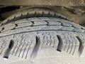 Close-up of tire tread on a 2017 Chevrolet Express showing detailed patterns and slight wear on the rubber surface