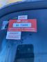A red and white vehicle certification sticker displaying the year 2026 and the words "Certificate of Approval" along with the monthly designations January and February