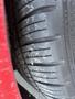 Close-up of a worn tire on a 2018 Ford Focus showing tread wear and surface imperfections