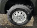 Close-up of a 2019 RAM Promaster tire and wheel showing the tire tread and silver steel rim with multiple bolt holes