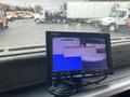 A PYLE monitor displaying multiple camera views with a red error message on one screen in a Hino 308 truck cabin