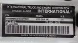 Label of a 2005 International 4300 truck showing details like VIN model and manufacturing date