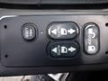 Control panel with buttons for win lock, auto window, auto door, and door lock on a 2015 International 4400