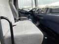 Interior view of a 2008 Hino 268 showing the driver's seat and dashboard with controls and a gear shift