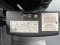 A control panel featuring buttons and instructions for manual operation on a vehicle with two indicator lights and a diagram on its surface