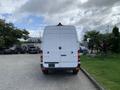 White 2017 Mercedes-Benz Sprinter van seen from the rear with dual doors and the iconic Mercedes-Benz logo prominently displayed