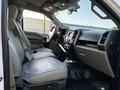 Interior view of a 2017 Ford F-150 showing front seats dashboard and steering wheel