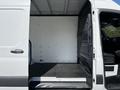 2022 Mercedes-Benz Sprinter van with an open side door revealing an empty cargo area featuring a flat floor and gray walls