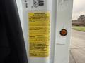 A label attached to a 2007 International 4200 detailing manufacturing information weight specifications and vehicle identification numbers