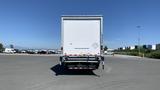 2019 International 4300 box truck with a large white cargo area and a roll-up door at the rear