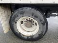 Close-up of a 2008 Hino 268 truck tire showing tread pattern and wheel rim