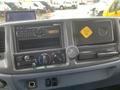 Dashboard of a 2008 Hino Conventional Cab featuring audio controls air conditioning knobs and storage compartment