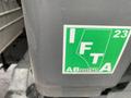 A green and white sticker displaying the letters IFTA and the number 23 along with the state abbreviation AB and a registration number 2337347