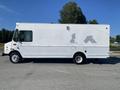 A 2006 Workhorse W42 delivery truck with a white exterior and a boxy design featuring a side view showing wheels and windows