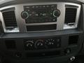 Dashboard of a 2008 Dodge Ram 5500 featuring audio controls climate knobs and various buttons for vehicle settings