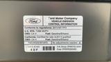 A 2013 Ford Econoline emission control information label with details on compliance and fuel specifications