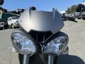 Front view of a 2018 Triumph Street Triple RS motorcycle showcasing its distinctive headlights and sleek design