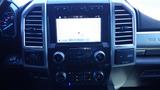 Interior dashboard of a 2017 Ford F-350 SD featuring a central touchscreen display and various control buttons