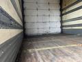 A 2008 Hino 268 truck interior showing a spacious cargo area with wooden flooring and metal strip details along the walls