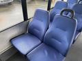 Seats in a 2018 Chevrolet Express interior with blue fabric upholstery and ergonomic design