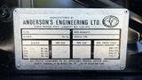 A metallic plaque from a 1995 Freightliner FLL086 displaying vehicle specifications including VIN tire size rim size and inflation pressures