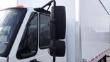 A 2012 International TerraStar truck with a prominent side mirror and sleek cab design