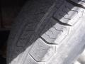 Close-up of a tire tread on a 2010 Forest River Enclosed showing the detailed pattern and wear of the rubber surface