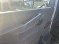 Interior door handle and controls of a 2017 Chevrolet Express van