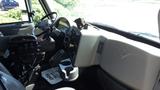 Interior view of a 2013 International 7400 Workstar showing the dashboard steering wheel and control panel