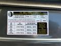 A label displaying tire and loading information for a 2021 Mercedes-Benz Sprinter including seating capacity and recommended tire pressure for different positions