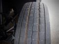 Close-up of a worn tire on a 2003 Freightliner MT45 Chassis showing tread patterns and wear indicators