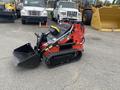 A red and black 2024 AGT Industrial LRT23 compact track loader with a front bucket attachment and tracked wheels