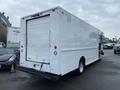 A white 2005 Freightliner MT45 Chassis van with a closed rear door and no visible branding or markings