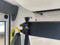 Interior view showing the seatbelt latch and mounting of a 2017 Chevrolet Express bus