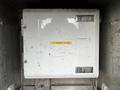 A white accessory panel with a yellow label reading ACCESSORY PANEL mounted in a metal enclosure