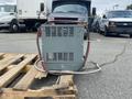 A 2004 Crown RR5210-35 battery charger with a gray exterior and ventilation grills is positioned on a wooden pallet