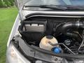 A 2017 Mercedes-Benz Sprinter engine bay showing the air filter housing and fluid reservoirs