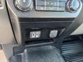 Interior console of a 2019 Ford F-350 SD showing climate controls USB ports and a power outlet