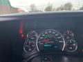 The dashboard of a 2017 Chevrolet Express displaying speedometer fuel gauge and odometer with the trip distance and outside temperature reading