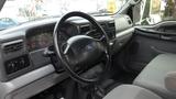 Interior view of a 2008 Ford F-650 showing the steering wheel dashboard and front seats