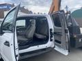 A 2017 Ford F-550 with an open driver's side door showing a spacious interior and gray seats inside