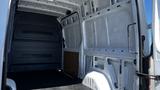 Interior of a 2016 Mercedes-Benz Sprinter van showing the cargo area with empty walls and floor