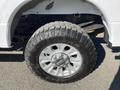 Close-up of a chrome wheel with a rugged Goodyear tire mounted on a 2019 Ford F-350 SD