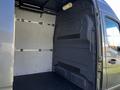Interior view of a 2021 Mercedes-Benz Sprinter cargo van showing the empty cargo space with a smooth floor and side walls