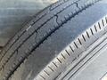 Close-up of a tire from a 2010 Freightliner MT45 Garbage Truck showing tread patterns and detail of the rubber surface