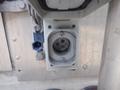 Close-up of a power outlet on a 2007 Morgan Olson Workhorse W42 showing a circular socket with three prongs and attached wiring