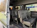 Interior seating of a 2019 Mercedes-Benz Sprinter showing multiple black leather seats with seatbelts